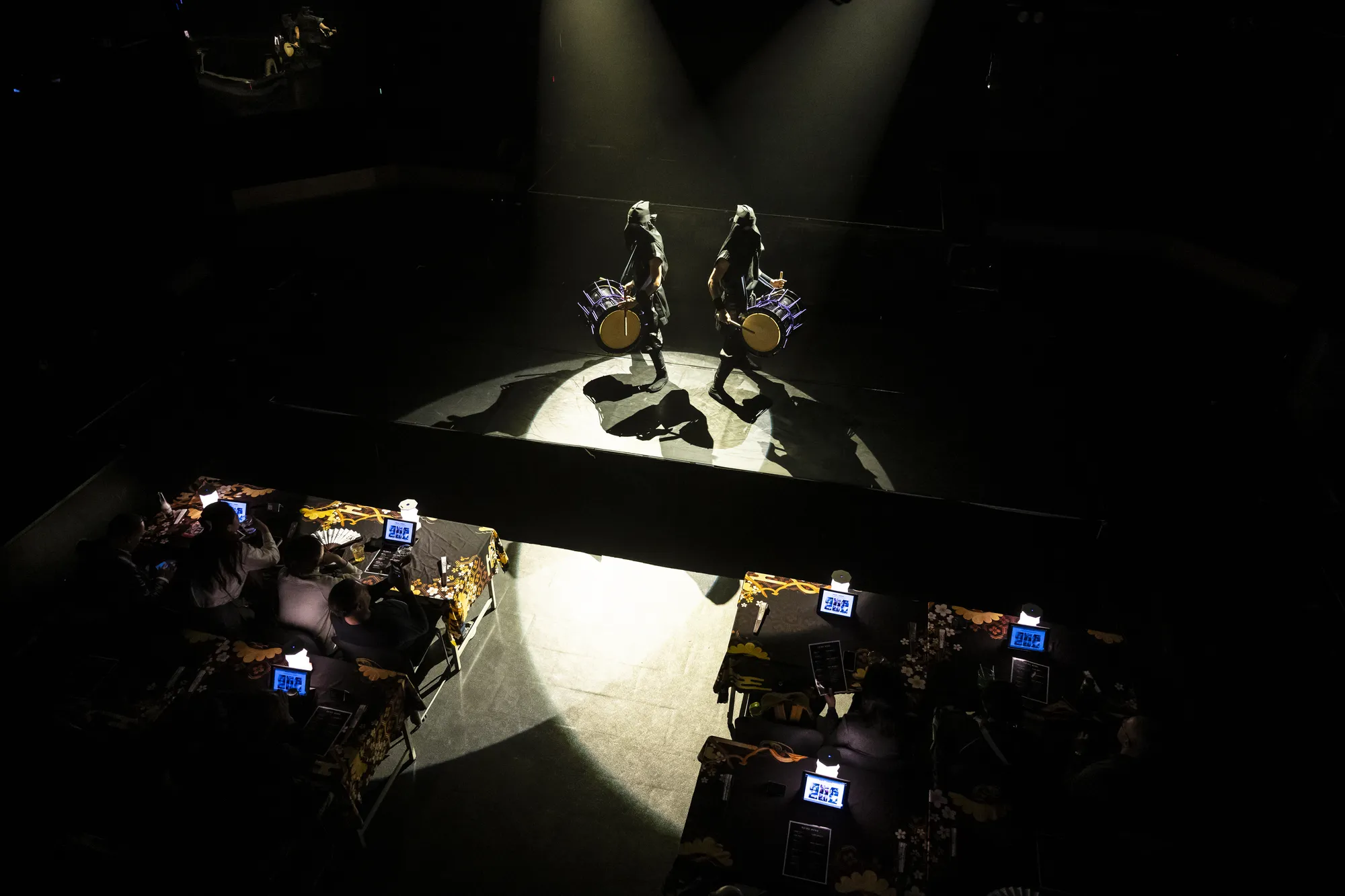 Performance under warm light — Ninja + Kabuki Tokyo