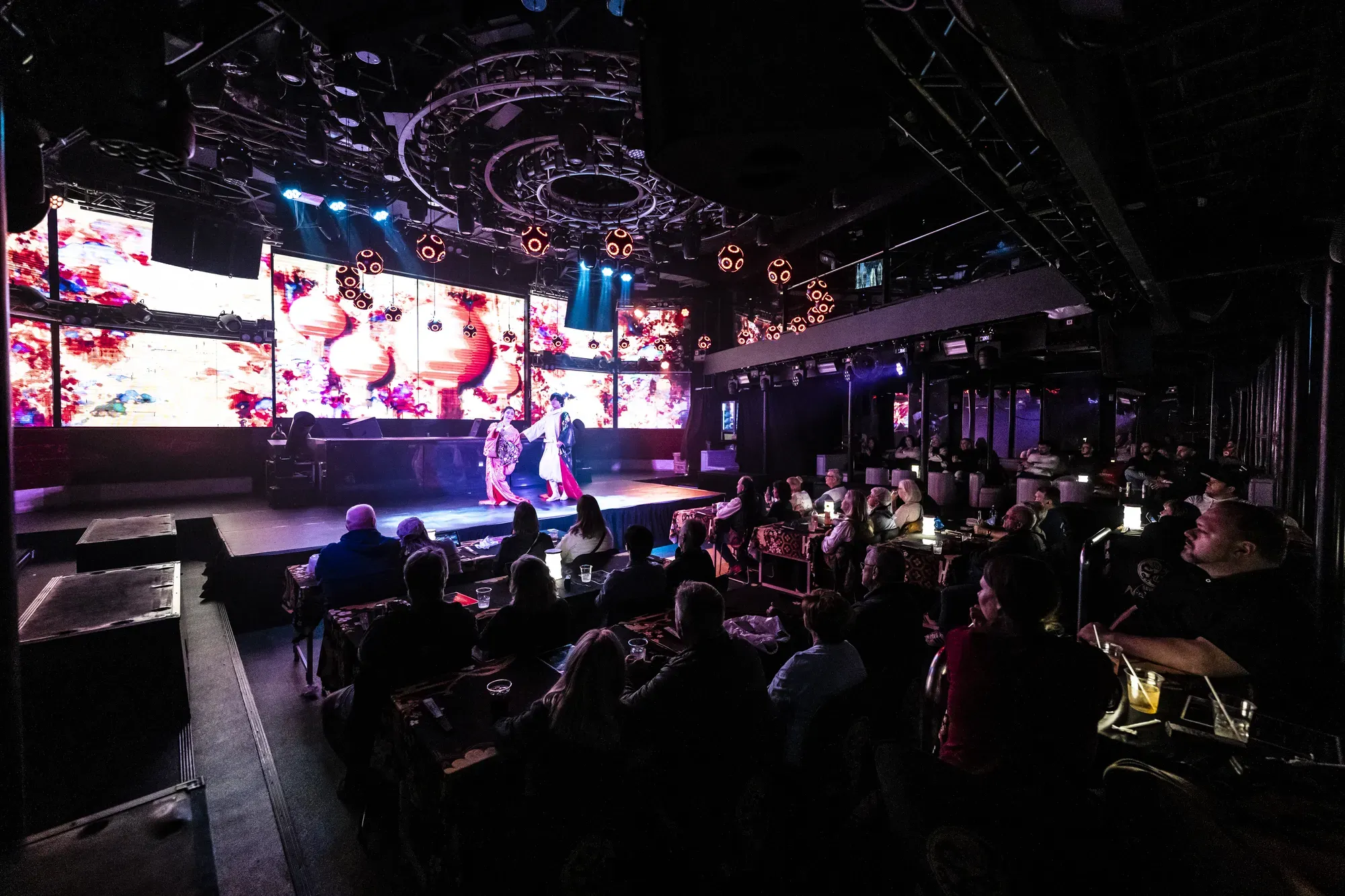 Finale scene in red light — Ninja + Kabuki Tokyo