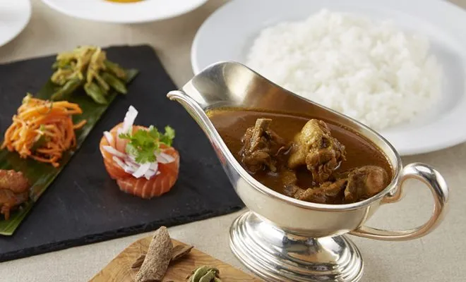Signature curry served in a silver gravy boat at Shinjuku Nakamuraya